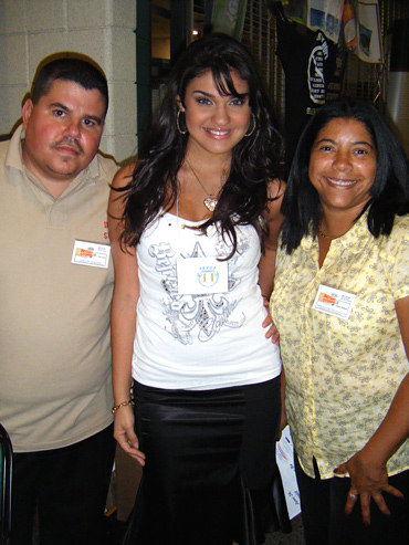 a Ms Latina International Delegate with Business Expo attendees