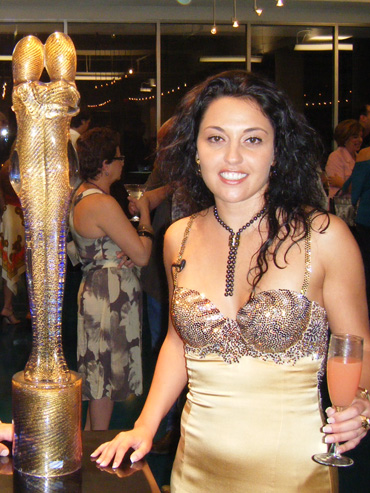 Designer, Emeshel next to one of her Crystal Pieces